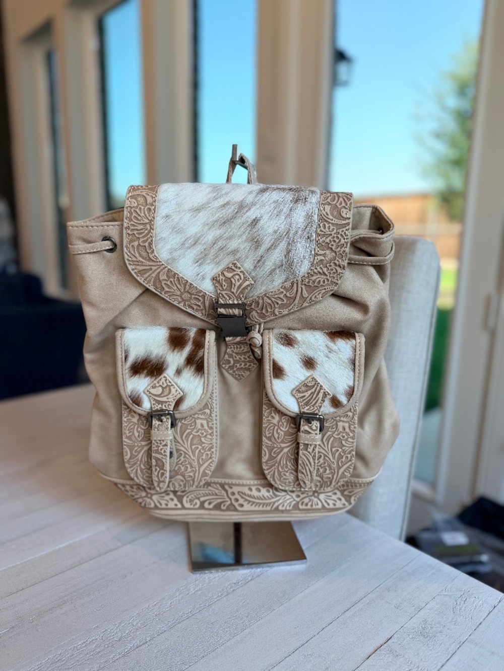 Trinity Ranch Genuine Hair-On Cowhide Tooled Backpack Tan